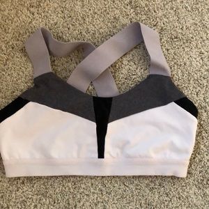 Pink, lavender and black sports bra